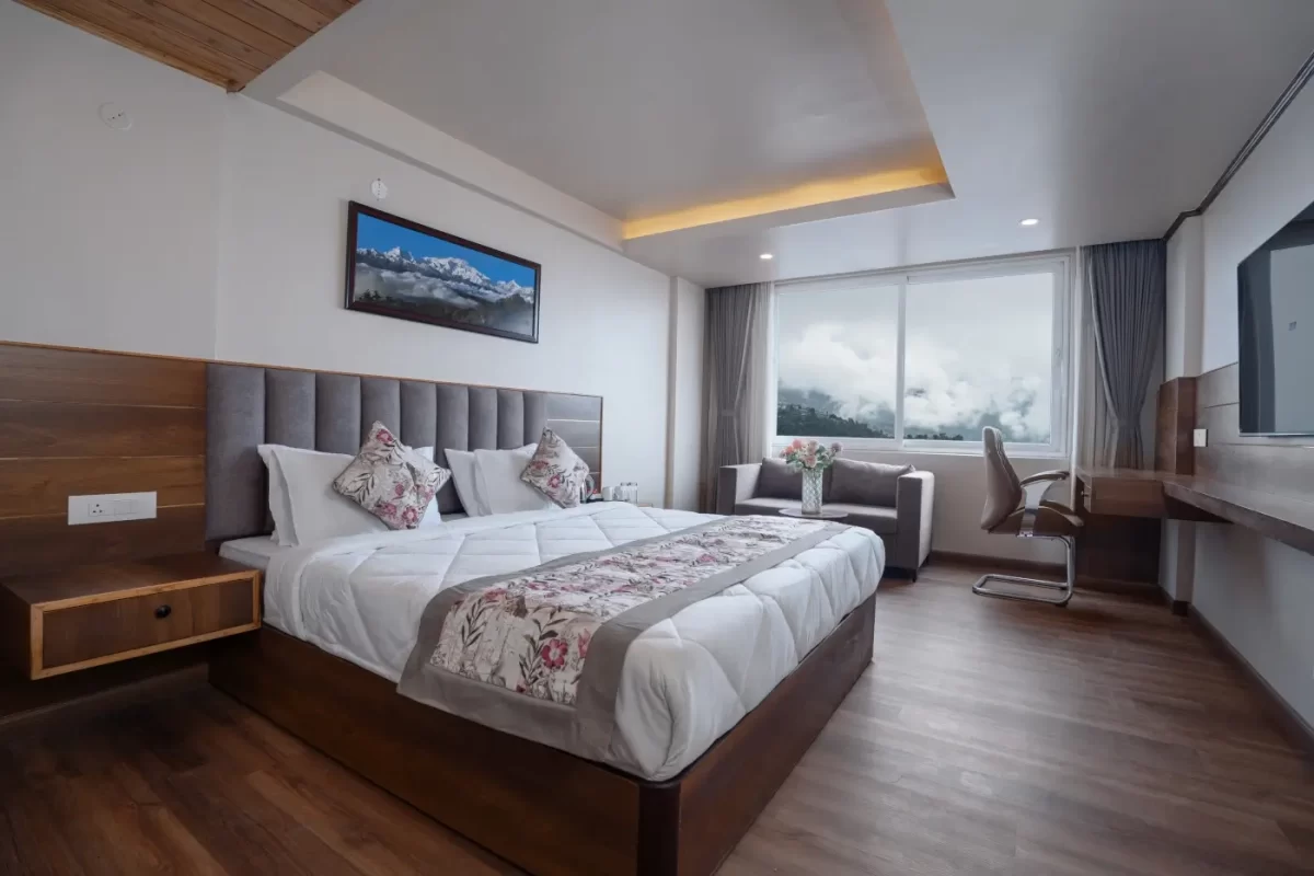 executive view room in Darjeeling with king bed and kanchenjunga view