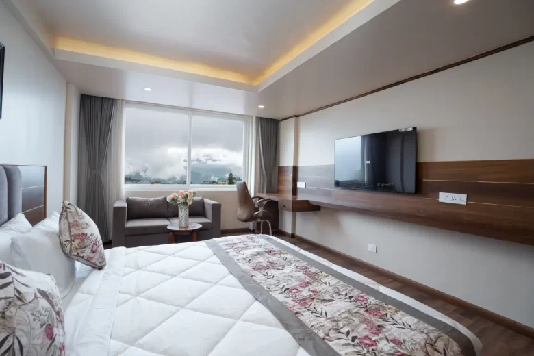 executive view room in Darjeeling with king bed and kanchenjunga view