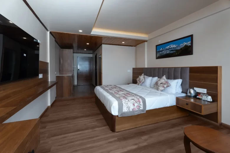 executive view room in Darjeeling with king bed and kanchenjunga view