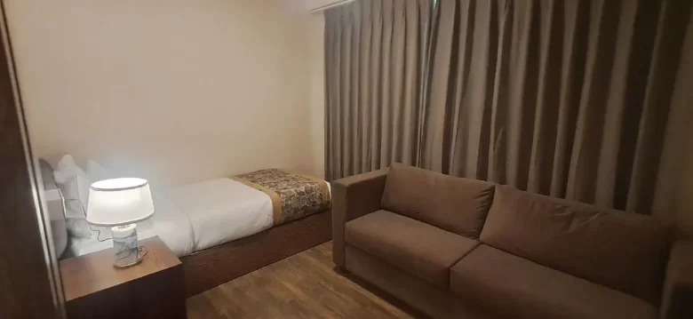 Family junior non view room in Darjeeling with king and single bed