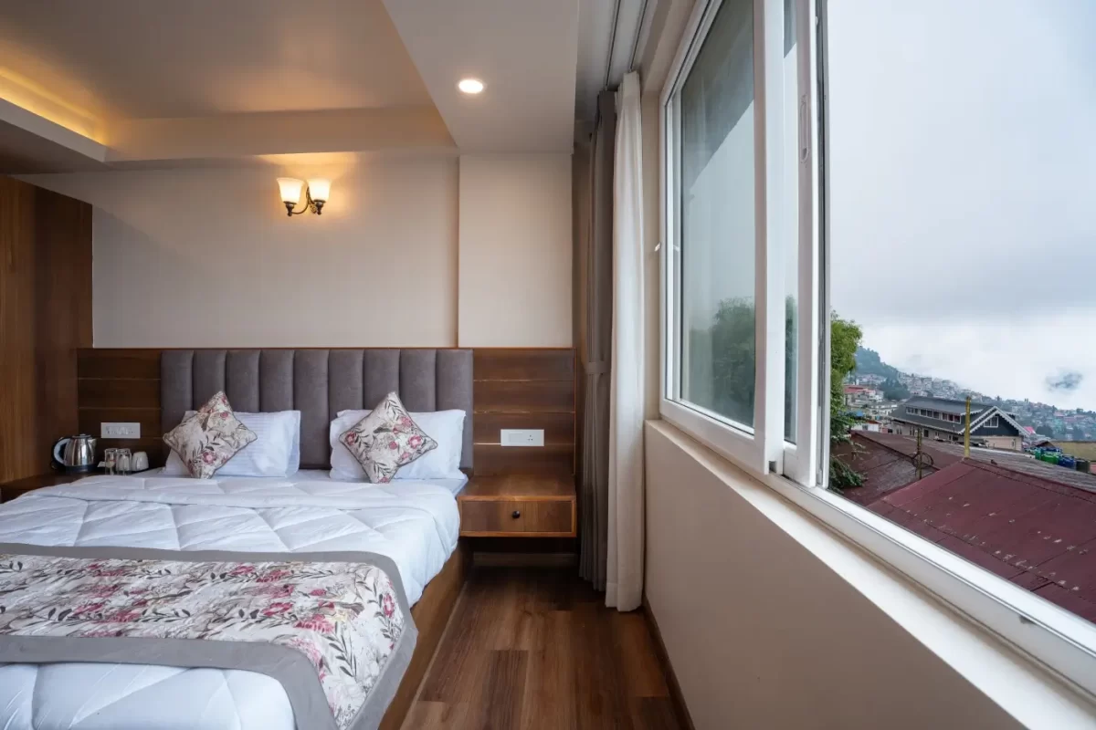 family view room in Darjeeling with two king beds and kanchenjunga view